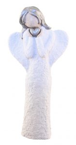 angel figurine holding heart